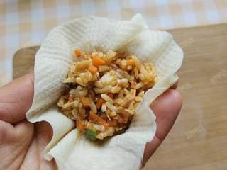 Steamed Rice and Pork Dumplings step 10: Place a wrapper in your palm and add an appropriate amount of filling to the cen
