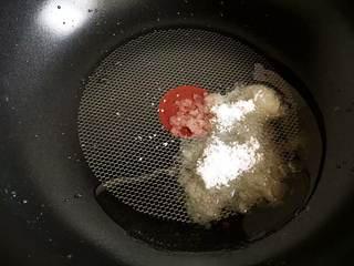 Chicken Thighs and Potato Stir-Fry step 4: Heat oil in a wok or skillet. Add the sugar and cook over medium-low heat until