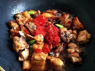 Chicken Thighs and Potato Stir-Fry step 7: Stir in the fermented bean paste and tomato paste. Cook briefly until the season