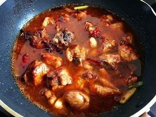 Chicken Thighs and Potato Stir-Fry step 8: Pour in enough water to cover the ingredients. Bring to a boil, then reduce the