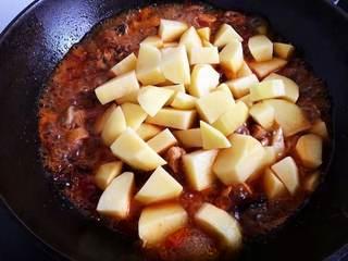 Chicken Thighs and Potato Stir-Fry step 9: Add the potato chunks and continue cooking until they are tender and have absorb
