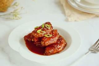 Braised Chicken Wings with Sweet and Savory Flavor step 8: Transfer to a serving plate and serve hot.