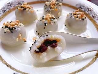 Sweet Red Bean Glutinous Rice Dumplings step 16: Enjoy the soft, chewy texture and sweet red bean filling.
