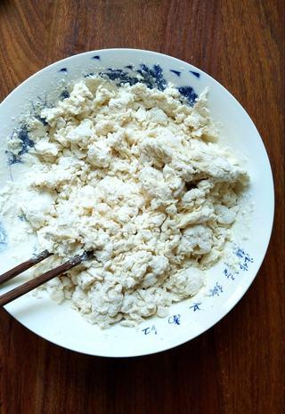 Scallion Pancakes step 1: Divide the flour into two portions. Mix one portion with boiling water and the o