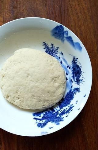 Scallion Pancakes step 2: Combine the mixtures and knead into a smooth dough. Cover and let rest for 30 mi
