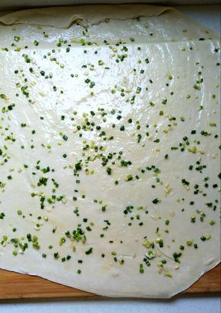 Scallion Pancakes step 6: Scatter the seasoned scallion mixture evenly over the dough.