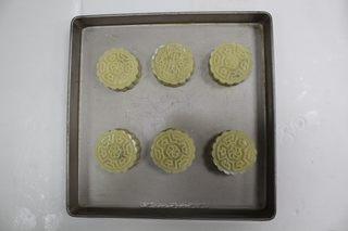 Five-Nut Mooncakes step 13: Arrange all shaped mooncakes on a baking tray.