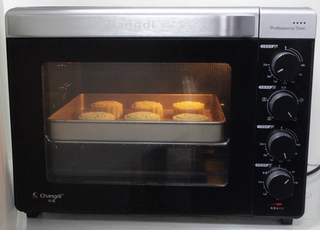 Five-Nut Mooncakes step 14: Lightly mist the mooncakes with water. Bake on the center rack of a preheated 18