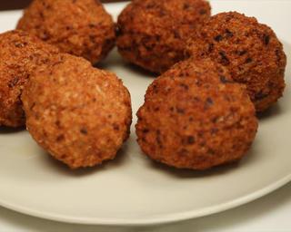 Braised Lion's Head Meatballs step 7: Heat oil to medium-high heat and fry the meatballs until golden brown on the out