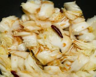 Hot and Sour Stir-Fried Cabbage step 7: Add the cabbage and stir-fry over high heat until slightly wilted but still cris