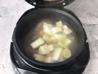 Winter Melon and Pork Rib Soup step 6: Season the soup with salt and a pinch of white pepper. Stir gently and serve hot