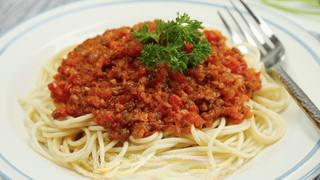 Beef and Tomato Pasta step 12: Serve the pasta topped with the beef tomato sauce and enjoy.