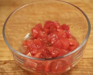 Beef and Tomato Pasta step 3: Peel the tomatoes and cut them into chunks.