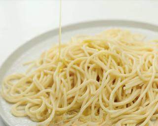 Beef and Tomato Pasta step 5: Drain the pasta and toss with a little olive oil to prevent sticking.