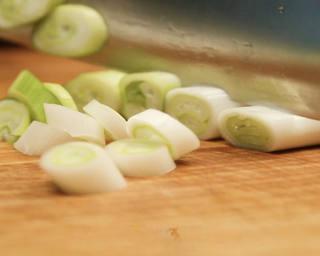 Scallion Lamb Stir-Fry step 2: Cut the scallions diagonally into bite-sized pieces.