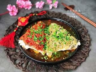 Steamed Fish Head with Chili Sauce step 10: Sprinkle scallion greens over the steamed fish head and drizzle the hot oil on t