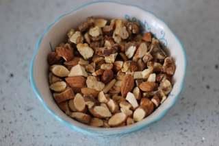 Dark Chocolate Walnut Brownies step 3: Cut the hazelnuts into smaller pieces and combine them with the toasted walnuts.