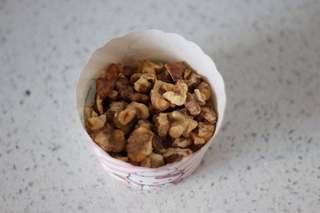 Dark Chocolate Walnut Brownies step 4: Prepare additional walnuts and hazelnuts for topping.