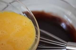 Dark Chocolate Walnut Brownies step 8: Mix in the room-temperature egg yolks until the batter becomes smooth and glossy