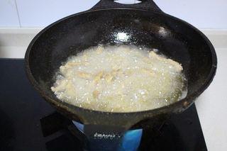 Sweet and Sour Pork Strips step 8: Heat oil to medium temperature and fry the pork strips over low heat until cooke