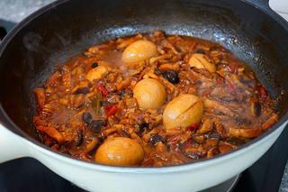 Braised Pork Belly with Mushrooms and Eggs step 21: Stir occasionally during braising and turn the eggs occasionally for even colori