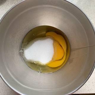 Coconut Egg Tart Recipe step 2: Whisk the eggs and sugar together until smooth and the sugar has dissolved.