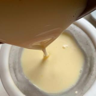 Coconut Egg Tart Recipe step 5: Fill each tart shell about 80–90% full with the custard.