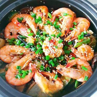 Spicy Mala Stir-Fry with Pork, Shrimp and Mixed Vegetables step 16: Garnish with toasted white sesame seeds and chopped green onions.