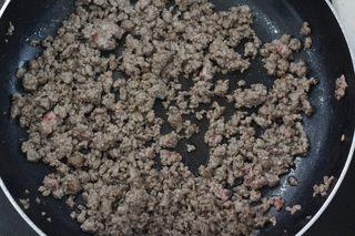 Spicy Beef Chili Crisp step 2: Pulse the beef in a food processor or finely mince it by hand until it reaches a