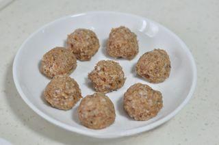 Steamed Pork Meatballs with Shiitake Mushrooms step 7: Shape the mixture into evenly sized meatballs using your hands or a spoon.