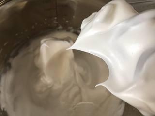 Japanese Yogurt Cheesecake step 7: Add a few drops of lemon juice to the egg whites. Gradually add the sugar while 