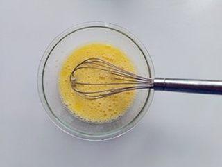 Egg and Tomato Stir-Fry step 4: Beat the eggs with a pinch of salt and a small splash of water until smooth.