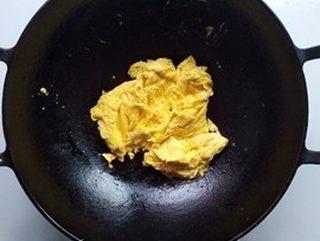 Egg and Tomato Stir-Fry step 6: Gently stir until the eggs are softly set. Remove and set aside.