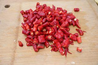 Sizzling Chili Garlic Sauce step 3: Cut the red chilies into small pieces.