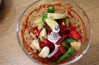 Sizzling Chili Garlic Sauce step 5: Place the chilies, ginger, and garlic into a food processor.
