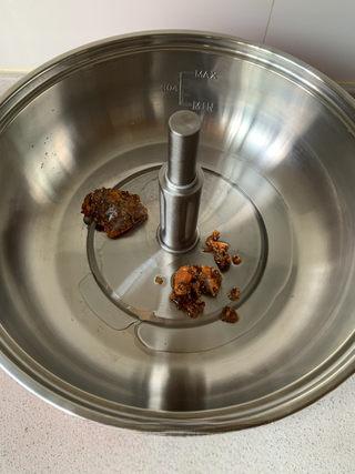 Spicy Pork Loin Hot Pot step 4: Heat a little oil in a pot and stir-fry the hot pot base over low heat until fra