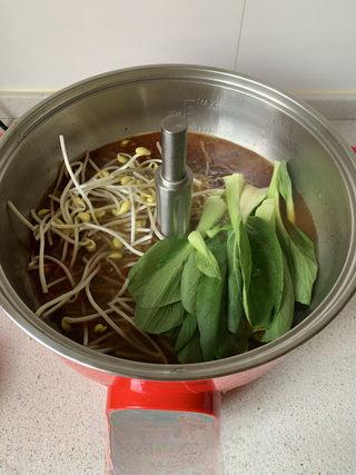 Spicy Pork Loin Hot Pot step 6: Bring the broth to a boil and blanch the vegetables until just tender.