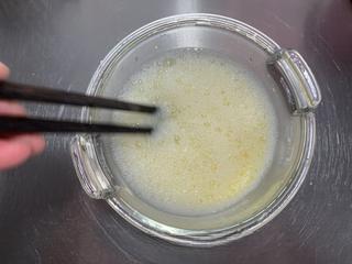 Steamed Egg Custard with Okra step 4: Stir gently until the mixture is smooth and evenly blended.