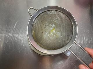 Steamed Egg Custard with Okra step 6: Strain the egg mixture through a fine sieve into a heatproof bowl.
