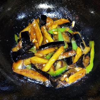 Braised Eggplant, Potato and Green Pepper step 11: Pour in the cornstarch slurry and cook until the sauce thickens and coats the ve