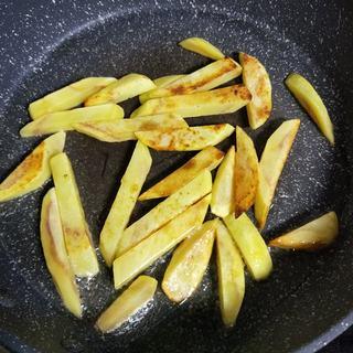 Braised Eggplant, Potato and Green Pepper step 4: Cook until the potatoes are golden brown on all sides. Remove and set aside.