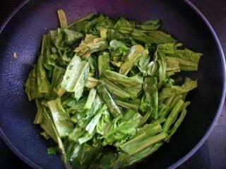 Garlic Stir-Fried Bok Choy step 4: Add the bok choy and stir-fry until it begins to wilt and reduce in volume.