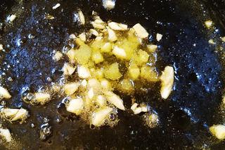Sweet and Sour Pork step 9: Add the minced garlic and stir until fragrant.