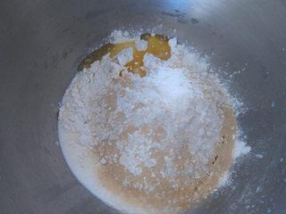 Cumin Fried Dough Sticks step 2: Combine the bread flour, milk, egg, vegetable oil, salt, sugar, and yeast in a m