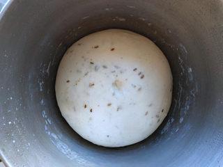 Cumin Fried Dough Sticks step 6: Divide the dough into two portions and shape each into a long log. Let rest for