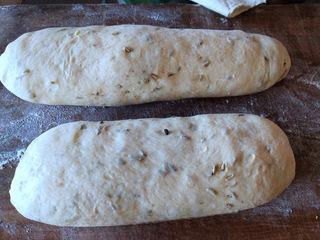 Cumin Fried Dough Sticks step 7: Roll each portion into a long rectangle and cut into strips about 1 cm wide.
