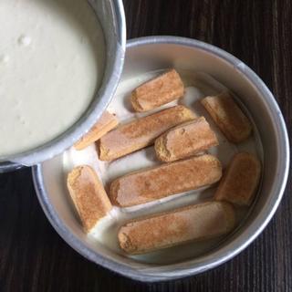 Classic Tiramisu Cake step 10: Add a second layer of soaked ladyfingers.