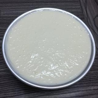 Classic Tiramisu Cake step 11: Cover with the remaining mascarpone cream and smooth the surface.