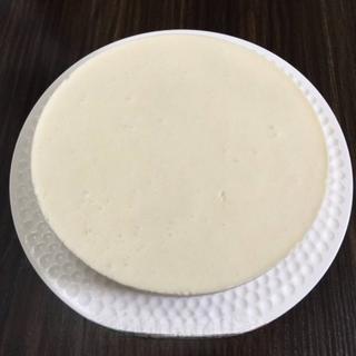 Classic Tiramisu Cake step 14: Place a decorative stencil or paper pattern over the top and dust evenly with co