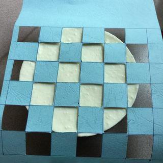Classic Tiramisu Cake step 15: Remove the stencil to reveal the cocoa pattern.